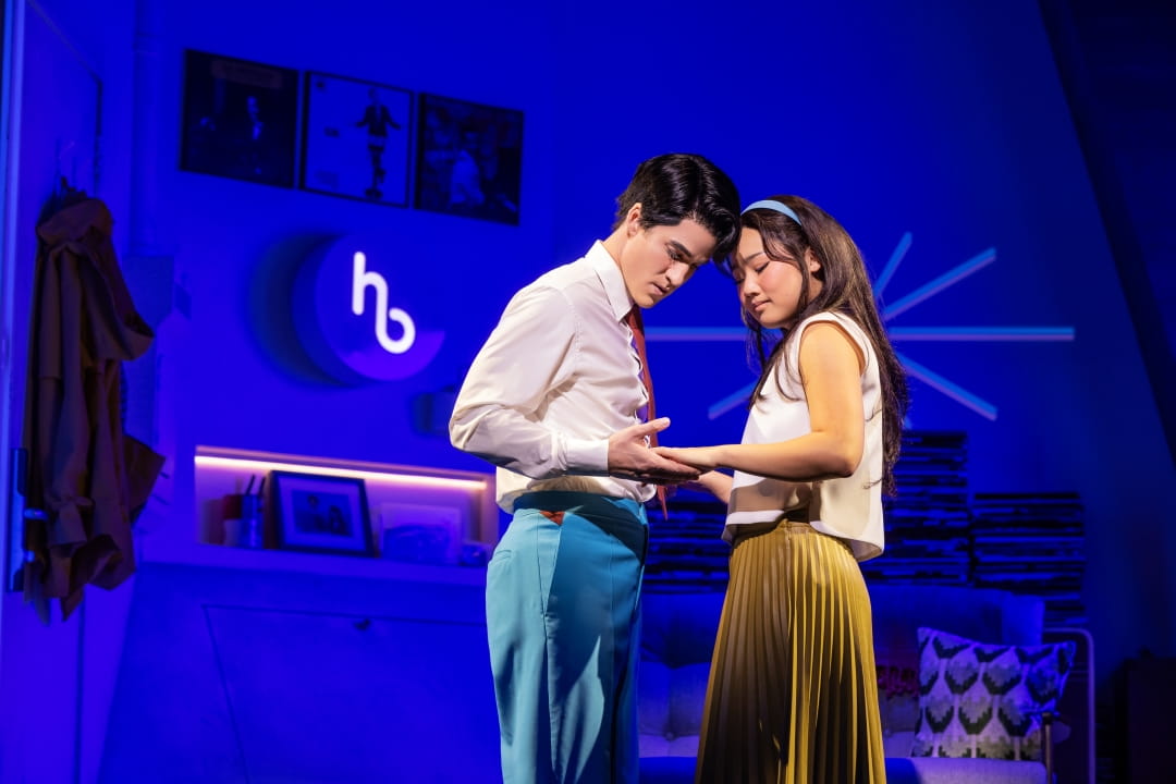 Darren Criss reacts as he holds Helen J Shen's hands In The Original Broadway Production Of MAYBE HAPPY ENDING. Photo By Matthew Murphy And Evan Zimmerman