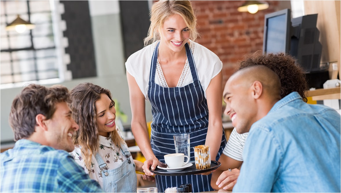 A photo of people enjoying a meal at a restaurant