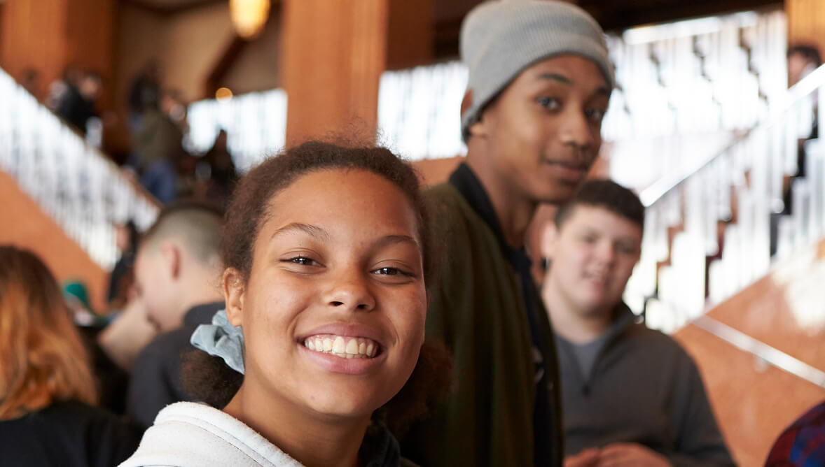 Jr. high students in the lobby before a student matinee 