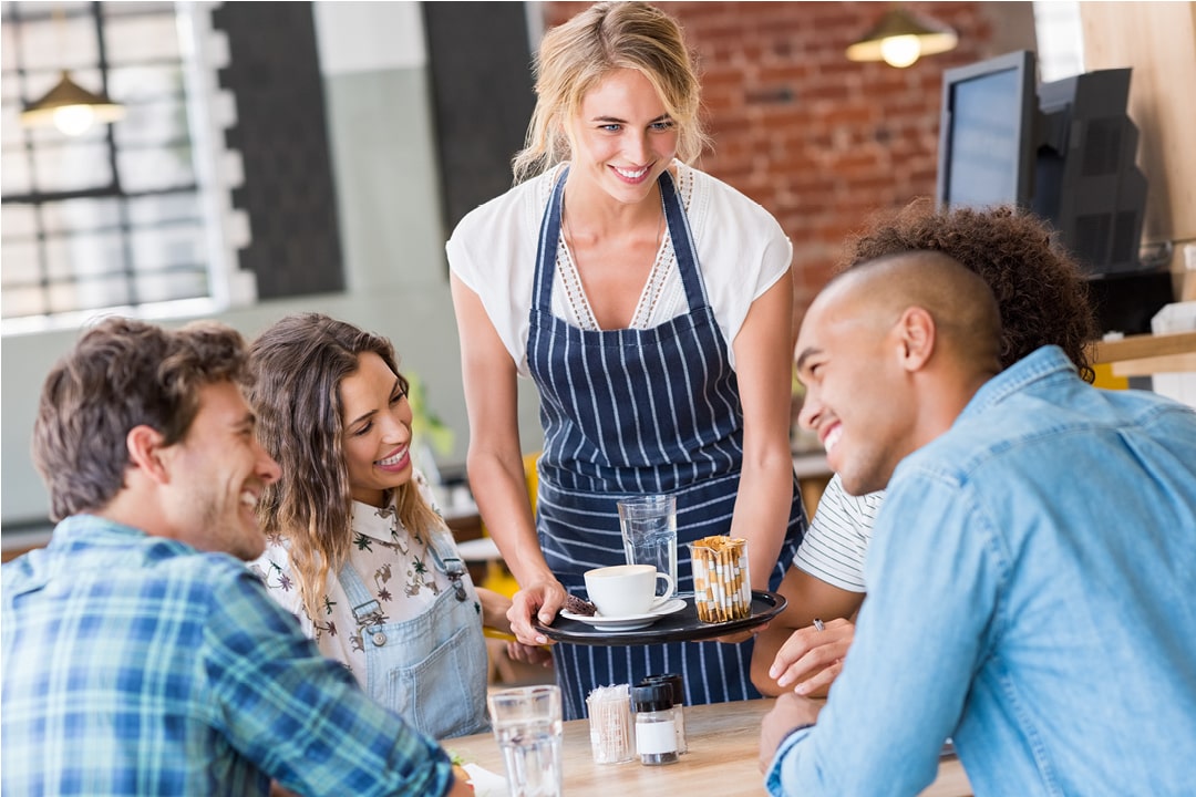 A photo of people enjoying a meal at a restaurant