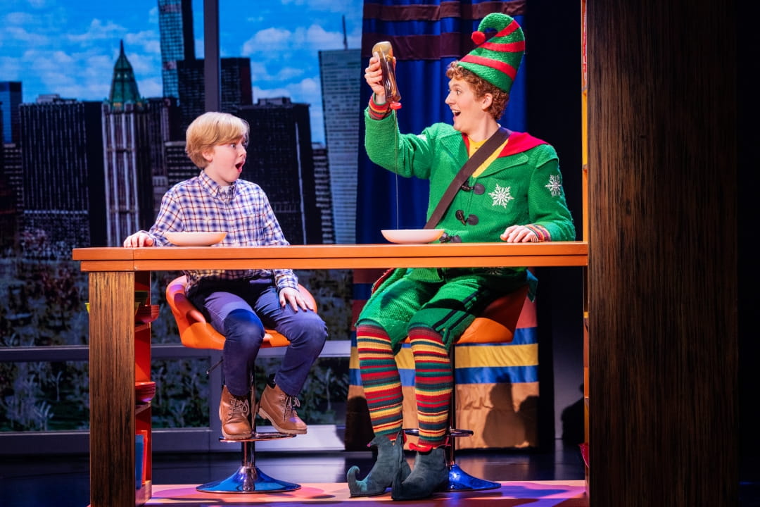 Ryan Duck (Michael Hobbs/Little Boy) amazed by Jack Ducat (Buddy) in ELF North American Tour Company, 2025 Photo by Evan Zimmerman for Murphymade