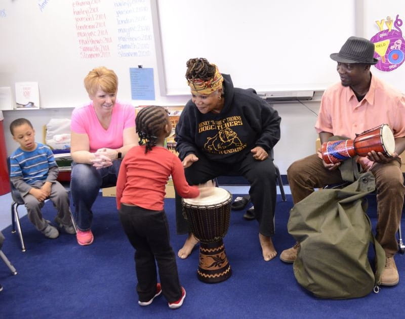 Teaching Artist Marcia Robinson inspires kids with art and music